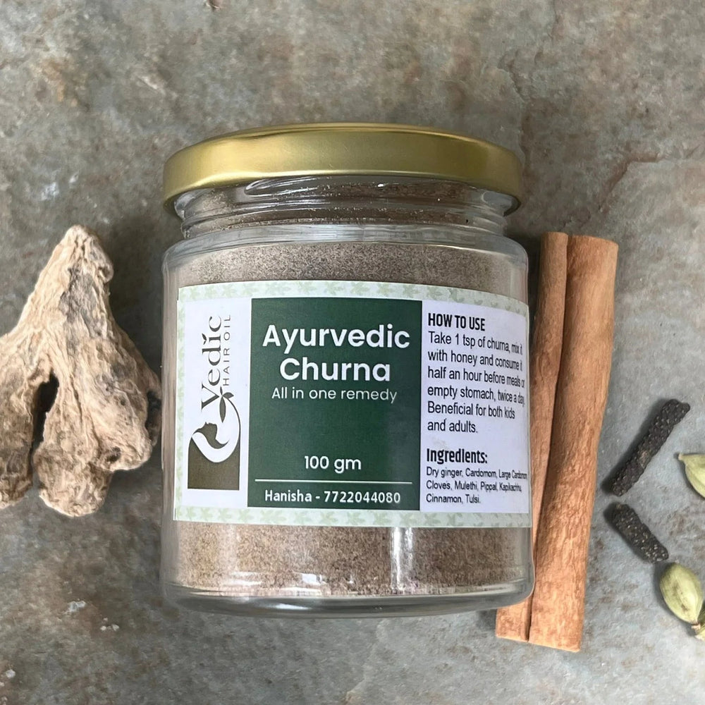a jar of Ayurveda churna with its ingredients - cinnamon, ginger, tulsi, clove, cardamom
