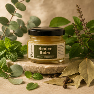 a jar of healer balm surrounded by its ingredients