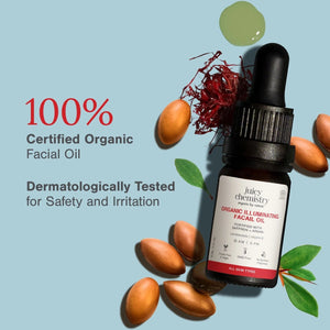 a bottle of Saffron & Argan facial oil showcasing ingredients and stating its 100% organic and dermatologically tested 
