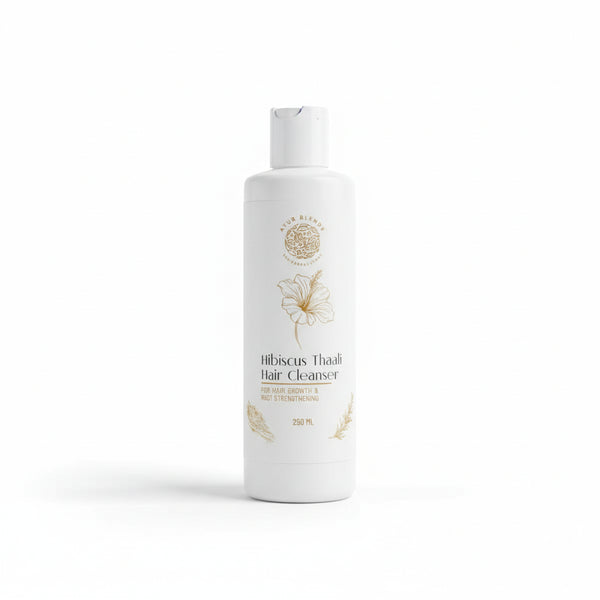a white bottle of Hibiscus Thaali hair cleanser