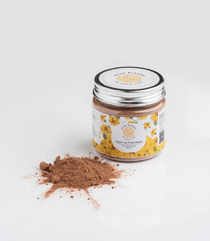 a jar of clean up face mask  showcasing the powder texture