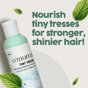 O'mumsie Tiny Tresses baby hair growth oil bottle nourishes tiny tresses for stronger, shinier hair