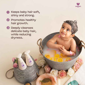Baby bathing in tub with orange slices and rose petals beside Maate Baby Shampoo bottles, natural vegan formula that keeps hair soft shiny and strong, promotes healthy growth, deeply cleanses while reducing dryness