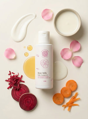 Ayur Blends Rose Milk Body Toning Oil bottle with rose petals, milk, beetroot, and carrot ingredients
